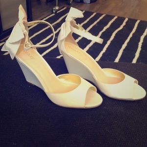Tevolio White Wedge Heels